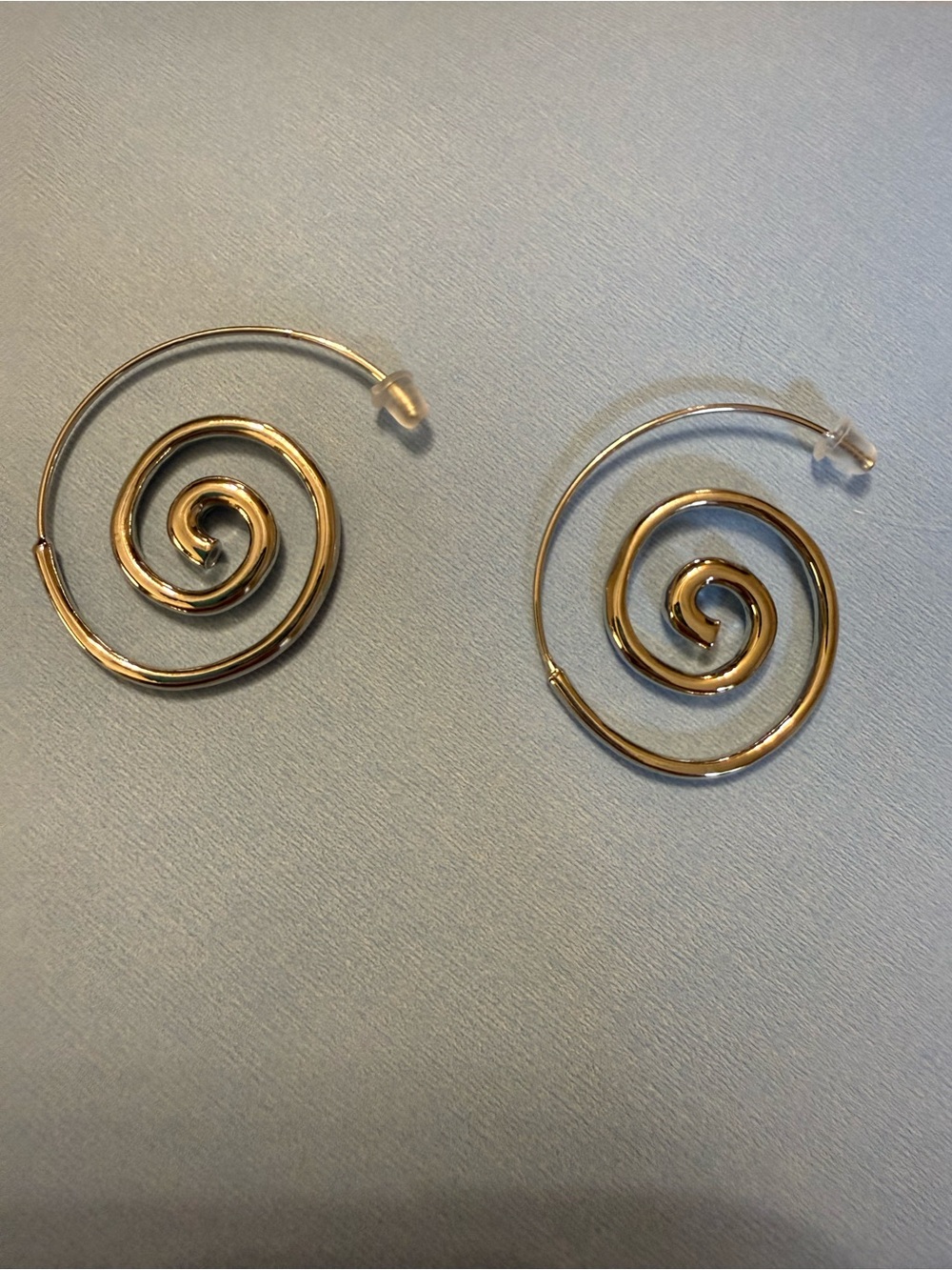Silver spiral hoops